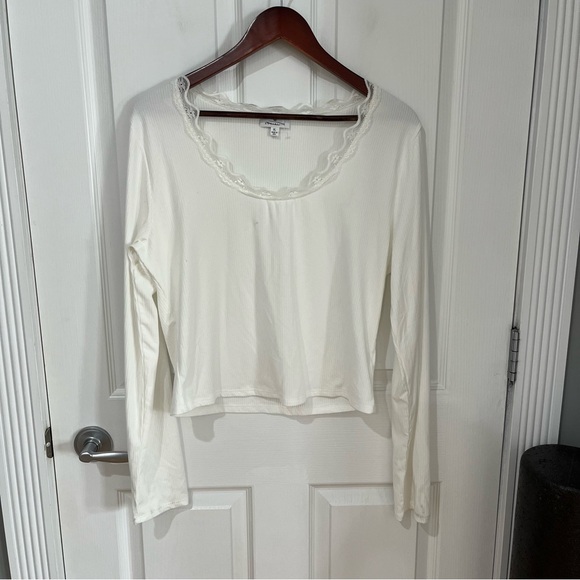 Socialite long sleeve scoop neck top in ivory color - Picture 1 of 9
